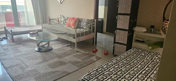 One bedroom apartment (for 3 females). The building is opposite Insurance Market Metro Station.