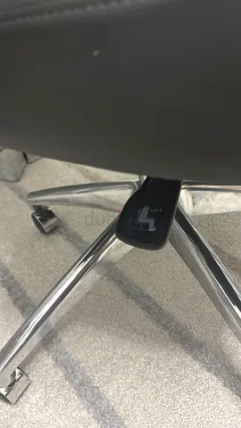 Light Used Dark Gray Leather Office management Chair with Tilt  Height Adjustment (Good Condition)