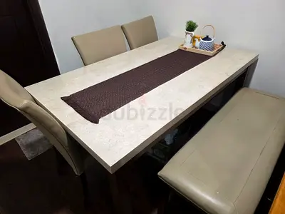 Dining Table with 4 chairs and a little bench sofa