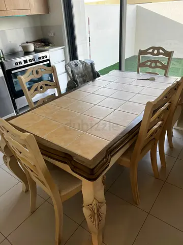 Solid wood dining table with 6 chairs and tiled top (price negotiable)