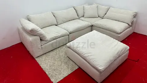 As perfect condition marina home luscious sofa with footstool
