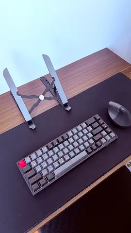 Workspace essentials: keyboard, mouse, headphones, laptop stand, large mouse pad and office chair