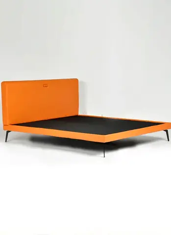 Low-Profile Orange Platform Bed with Upholstered Headboard. Used as an extra bed few times only