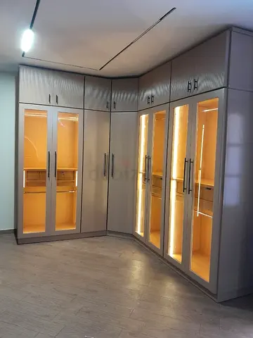 Custom L-shaped Built-in Wardrobe with Glass Doors  LED Lighting