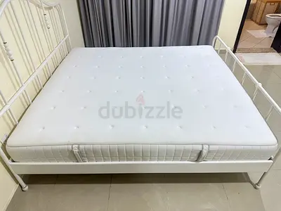 Almost new IKEA king bed with mattress 180cm x 200cm. Final price.Pickup from Khalifa city