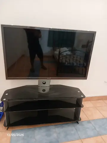 Panasonic 55-inch Flat Panel TV with Glass Stand - Good Working Condition