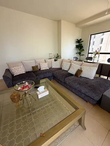 Grey two-seater sofa in good condition