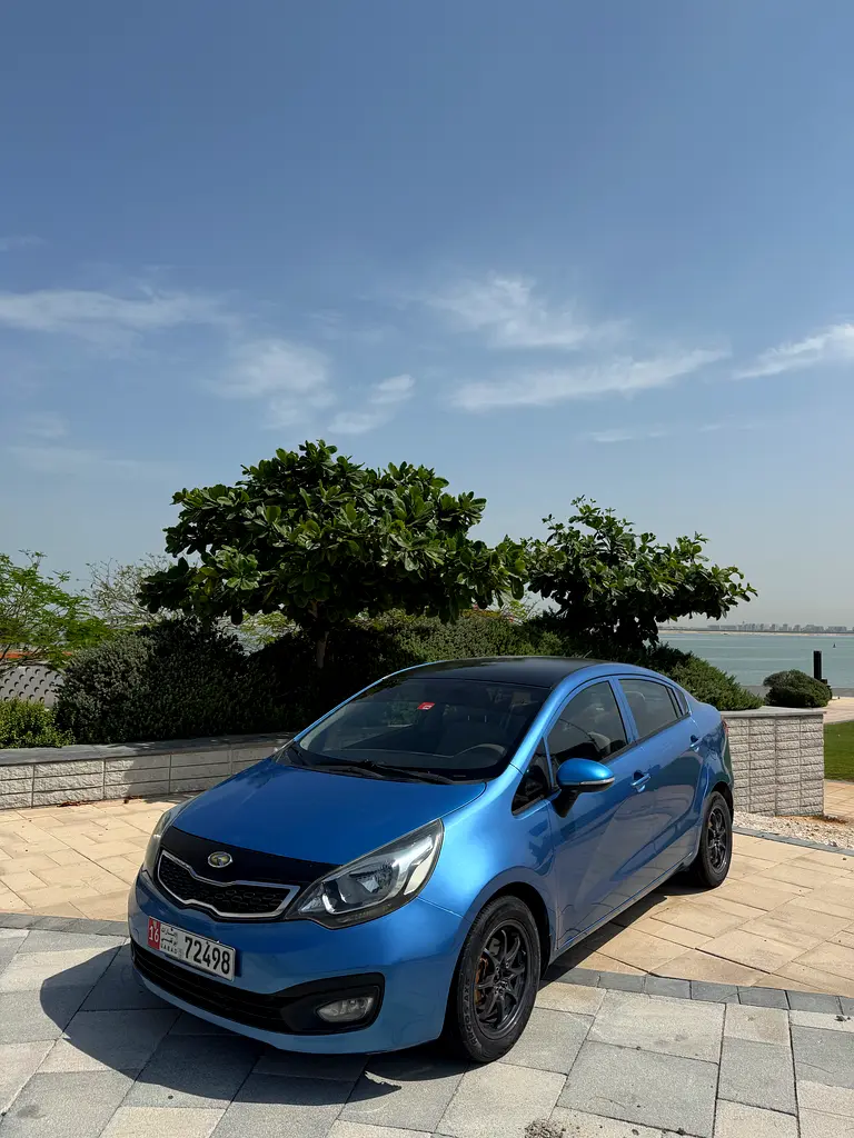 Kia Rio 2014 — photo 1 of 9