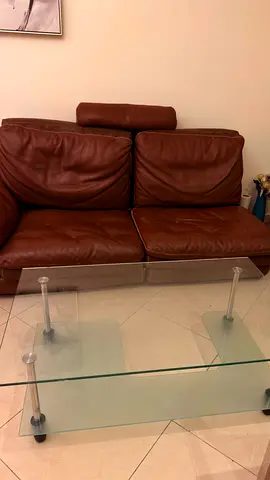 Brown leather 2-seater sofa with headrest - good used condition with glass table