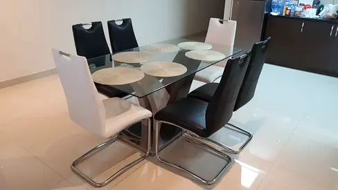 Glass Dining Table with 6 Modern Leather Chairs - Excellent Condition