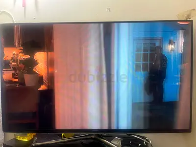 55-inch LED TV - Wall-mounted, Working Display (Some screen banding)