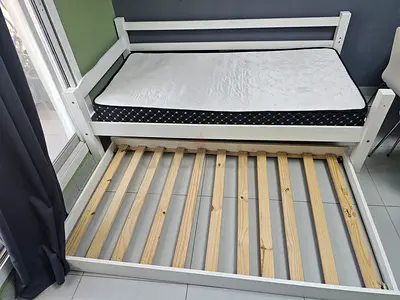 Ikea single bed with under bed for sale.