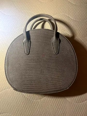 Round grey textured tote handbag with double handles