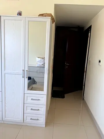 White Wooden Wardrobe with Mirror and Drawers