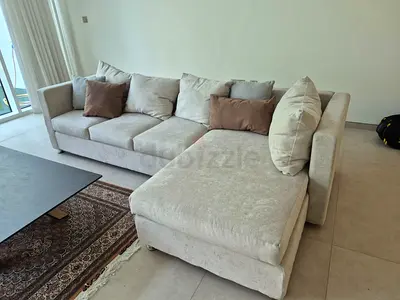 Light beige L-shaped fabric sofa with chaise, 3-seater
