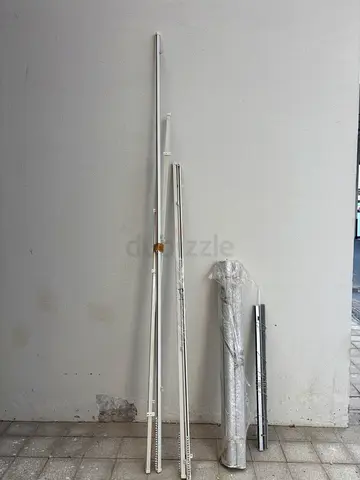 Set of aluminum curtain rods and rails - used, good condition