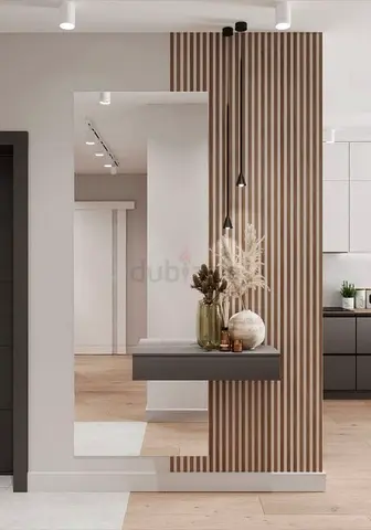 Wall-mounted hallway console shelf with vertical slat panel and mirror