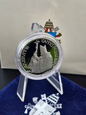 Silver proof coins with box and certificate.