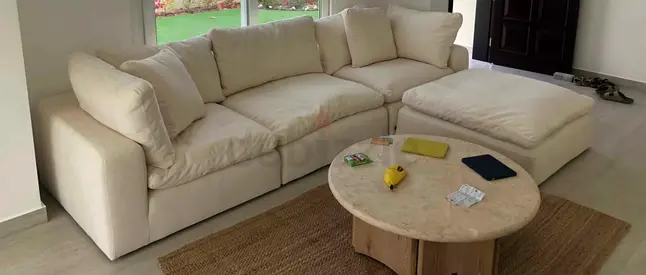 As perfect condition marina home luscious sofa with footstool