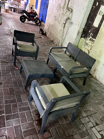 Outdoor rattan-style patio seating set - 2 chairs, 1 loveseat, 1 stool