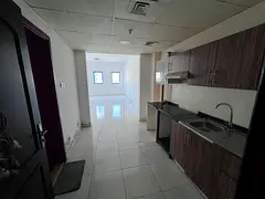 Large studio for rent in Falcon Towers Al Rashidiya 2 Ajman spacious layout central AC AED 23,000 ye