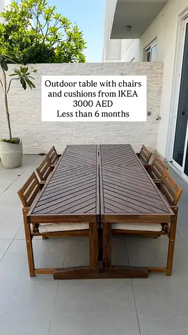 IKEA outdoor wooden dining table with 8 chairs and cushions - like new