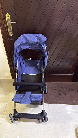 Lightweight blue baby stroller - used, good condition with car seat for baby both in good conditions