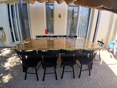 Wood Dining Table with 8 Black Chairs - Good Condition