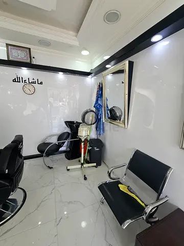 Well-maintained salon styling chairs and hair dryer setup - ready for use all furniture