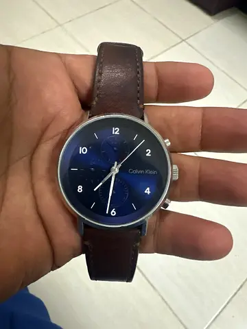 Calvin Klein mens wristwatch with brown leather strap, blue dial 5060.9460