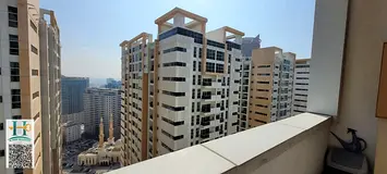 In city tower Ajman 2 bedroom with balcony open kitchen and payment plan