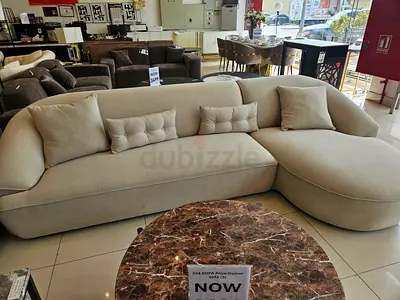 Large L-shaped cream fabric sofa with chaise | 1500 AED | Never Used | Urgent | Sharjah Muwaileh