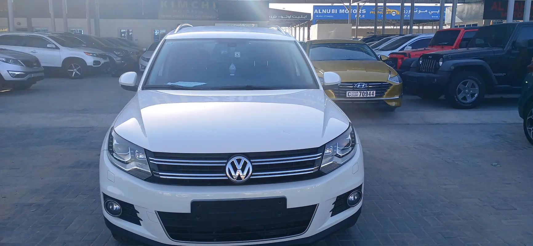 Volkswagen Tiguan 2012 — photo 1 of 11