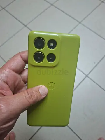 Motorola phone with green silicone case - used, good condition