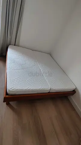 Wooden double bed frame with two single mattresses (assembled) - good condition