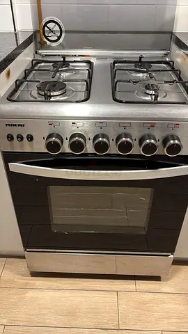 Used NIKAI 4-Burner Gas Cooker with Oven - Good Working Condition