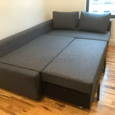 Gray L-shaped Sofa Bed with Pull-Out Trundle - Good Condition