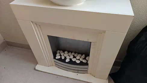 White Decorative Fireplace Mantel with Faux Stones