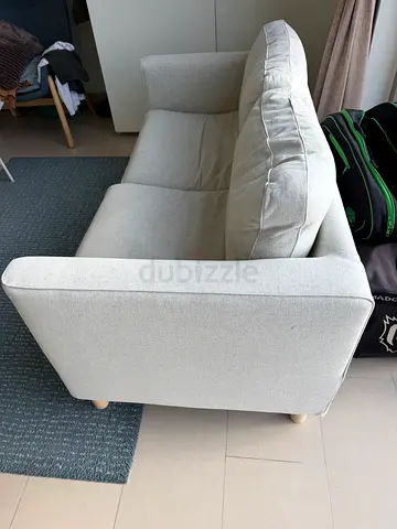 Light grey 2-seater sofa in good condition