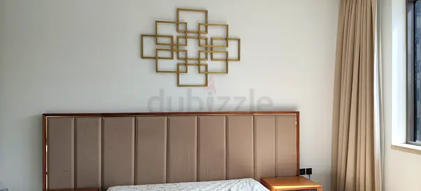 King size upholstered headboard with bedside table and wall decor (used)