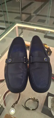 Mens black leather loafers - size unknown, gently used