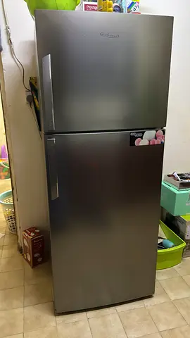 Large stainless steel refrigerator — good working condition