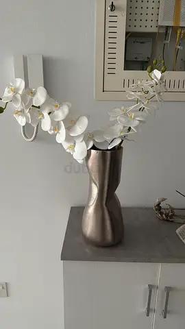 Artificial white orchid in modern metallic vase - decorative piece