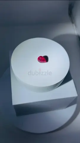 Natural Pear-Cut Pink/Red Gemstone (Loose) - Displayed