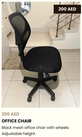 Compact black mesh office chair with wheels