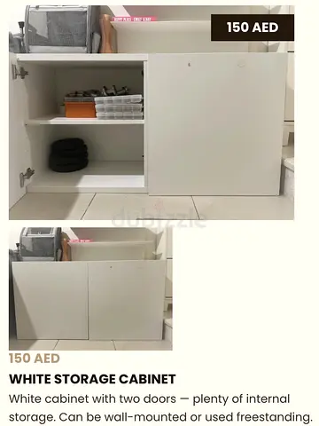 White Two-Door Storage Cabinet - Compact, Good Condition