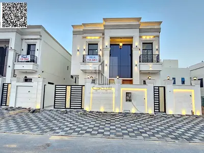 Luxury villa for sale in Ajman, including registration fees.