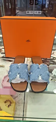 Pair of womens denim slide sandals - lightly used