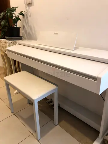White digital piano with bench - compact upright-style keyboard - 88 keys - Original price was 3,700