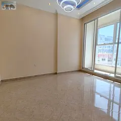 Two bedrooms and a living room for annual rent in Al Rawda 3, Ajman. Two bathrooms, balcony, parking